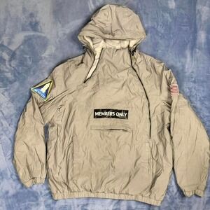 Members Only tan windbreaker jacket with hood and pockets. Men Size: XL